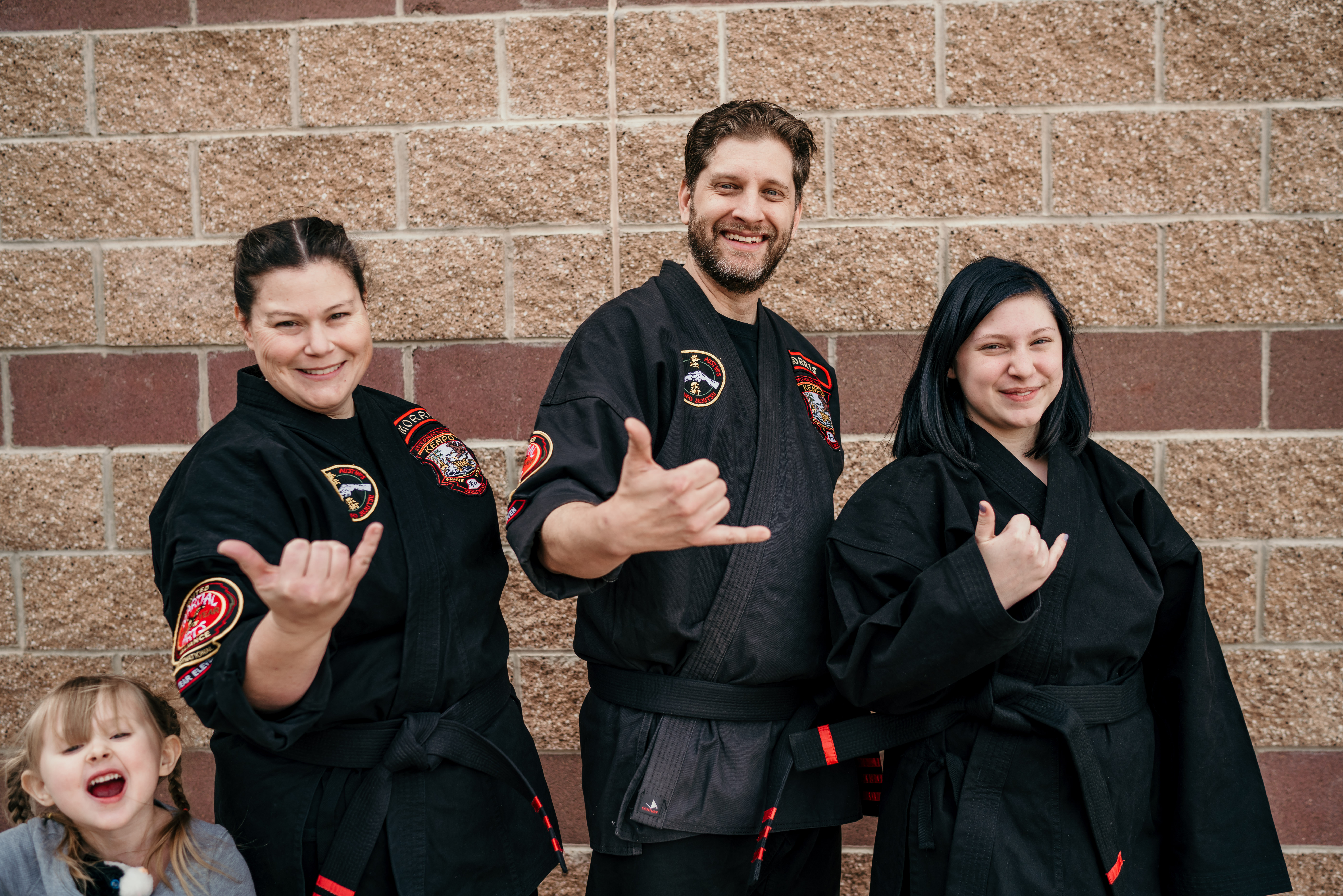 Instructors showing shaka sign