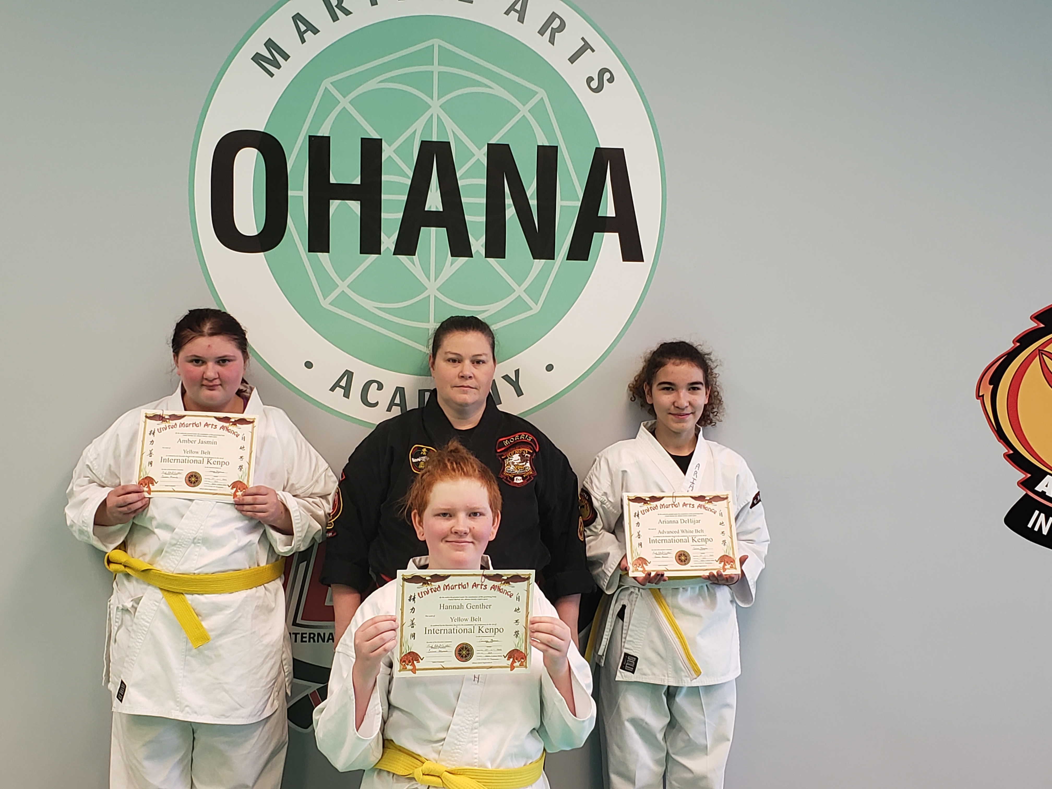 Three youth students with International Kenpo certificates